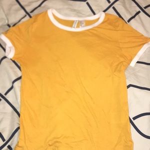 white shirt with yellow sleeves